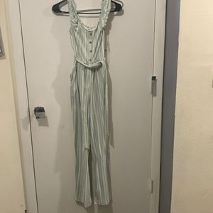 Green and white striped jumpsuit. Size small